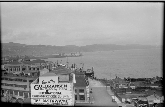 Wellington city scene including the intersection of Taranaki and Cable Streets. Just, F R :Two albums of photographs and captions relating to the Just family and 119 negatives taken by his father in the 1920s and 1930s of around Wellington and the Bell Bus Company. Ref: 1/2-071478-F. Alexander Turnbull Library, Wellington, New Zealand. http://natlib.govt.nz/records/23117809