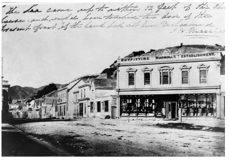 Circa 1860s photograph of the corner of Willis Street and Lambton Quay with Warmoll’s Outfitting Gold Diggers Establishment  were located at Clay Point, on part of the future site of Stewart Dawson’s Corner from circa 1861 - 1872.   Willis Street, Wellington, with outfitting business Warmoll's. Ref: 1/1-000694-F. Alexander Turnbull Library, Wellington, New Zealand. http://natlib.govt.nz/records/22850659