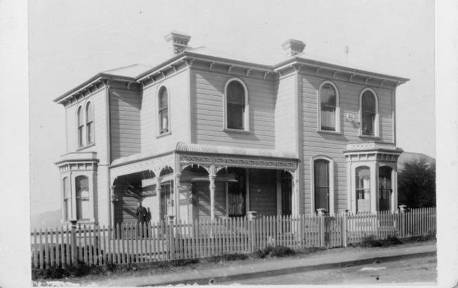 1890s - Creator unknown :Photograph of No 1 Tinakori Road with Mrs Innes on verandah to the left. Bradshaw, Muriel Agnes, 1899-1991 :Assorted collection of photographs and carte de visites. Ref: PA3-0331. Alexander Turnbull Library, Wellington, New Zealand. http://natlib.govt.nz/records/22895153