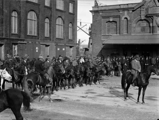 Mounted Special Constables in Wellington during the 1913 waterfront strike. Smith, Sydney Charles, 1888-1972 :Photographs of New Zealand. Ref: 1/2-046171-G. Alexander Turnbull Library, Wellington, New Zealand. http://natlib.govt.nz/records/22481051