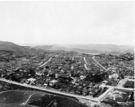 c.1920 - “View looking east from Vogeltown, across Newtown and toward Evans Bay and Miramar, Wellington. Hanson Street runs the breadth of the photograph in the foreground and Stoke Street is on the right. Taken by an unidentified photographer, circa 1920.” View of Newtown, Wellington. Ref: 1/2-152779-F. Alexander Turnbull Library, Wellington, New Zealand. http://natlib.govt.nz/records/22787891