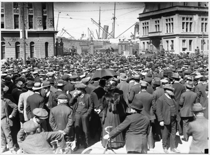 Crowd at Queens Wharf, Wellington, during the 1913 Waterfront Strike. Smith, Sydney Charles, 1888-1972: Photographs of New Zealand. Ref: 1/2-046169-G. Alexander Turnbull Library, Wellington, New Zealand.http://natlib.govt.nz/records/22836257  