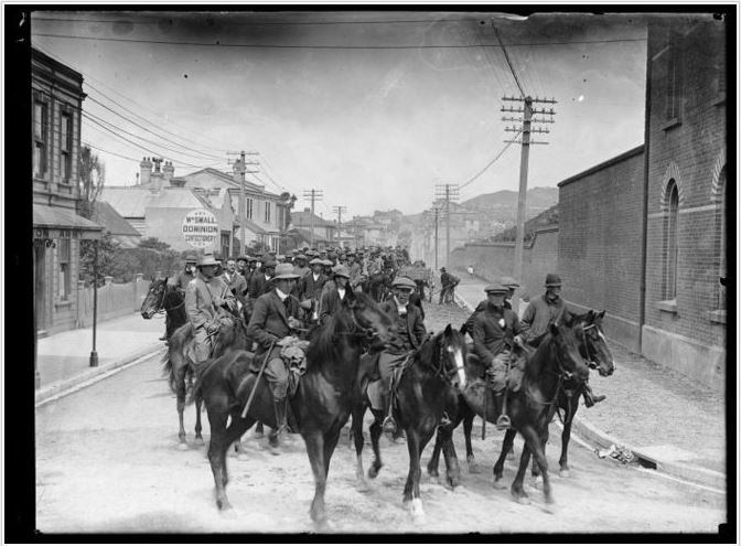 1913 – Mounted Special Constables during the 1913 waterfront strike. These were housed at a temporary camp within the Alexandra Barrack grounds. The Tasman Street wall can be seen to the right of the photograph. National Library reference: Mounted Special Constables during the 1913 waterfront strike, Wellington. Smith, Sydney Charles, 1888-1972 :Photographs of New Zealand. Ref: 1/2-049059-G. Alexander Turnbull Library, Wellington, New Zealand. /records/22325661